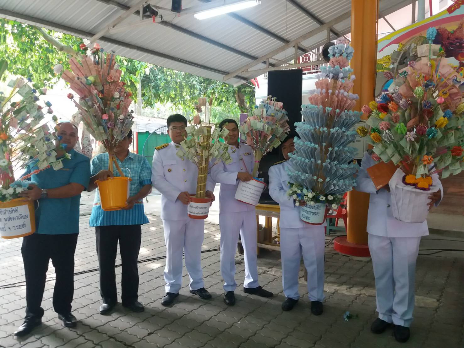 พิธีมอบเงินขวัญถุงกองทุนแม่ของแผ่นดิน และพิธีทอดผ้าป่าสมทบกองทุนแม่ของแผ่นดิน จังหวัดระยอง ประจำปี 2562