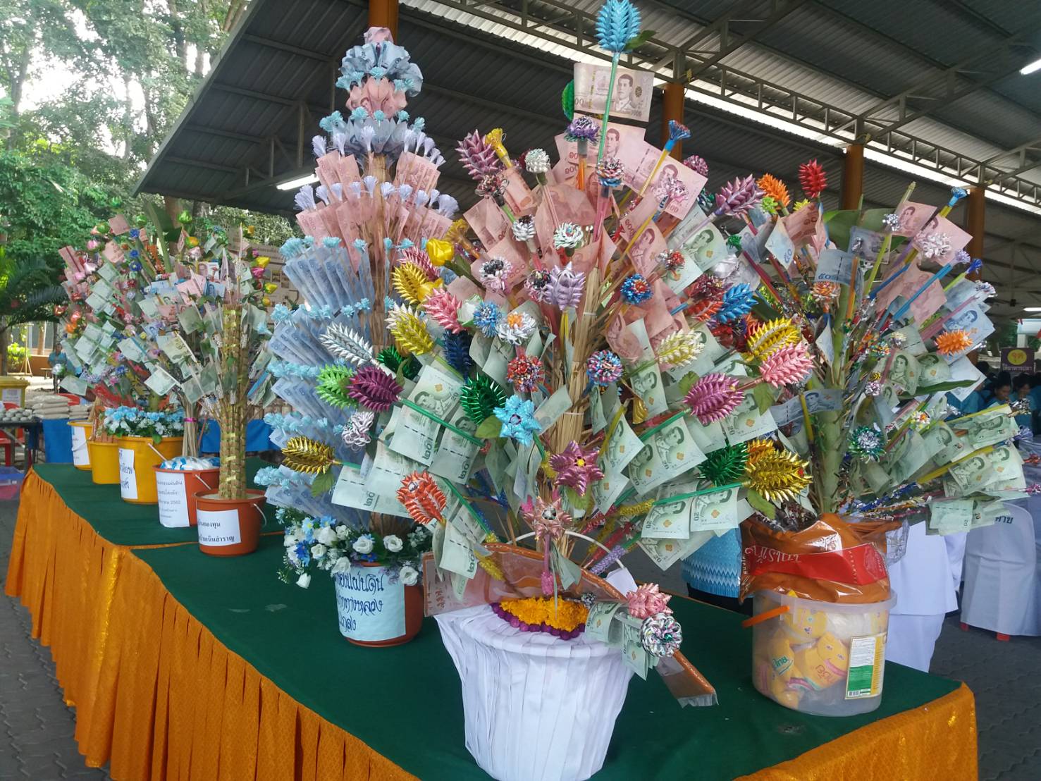 พิธีมอบเงินขวัญถุงกองทุนแม่ของแผ่นดิน และพิธีทอดผ้าป่าสมทบกองทุนแม่ของแผ่นดิน จังหวัดระยอง ประจำปี 2562